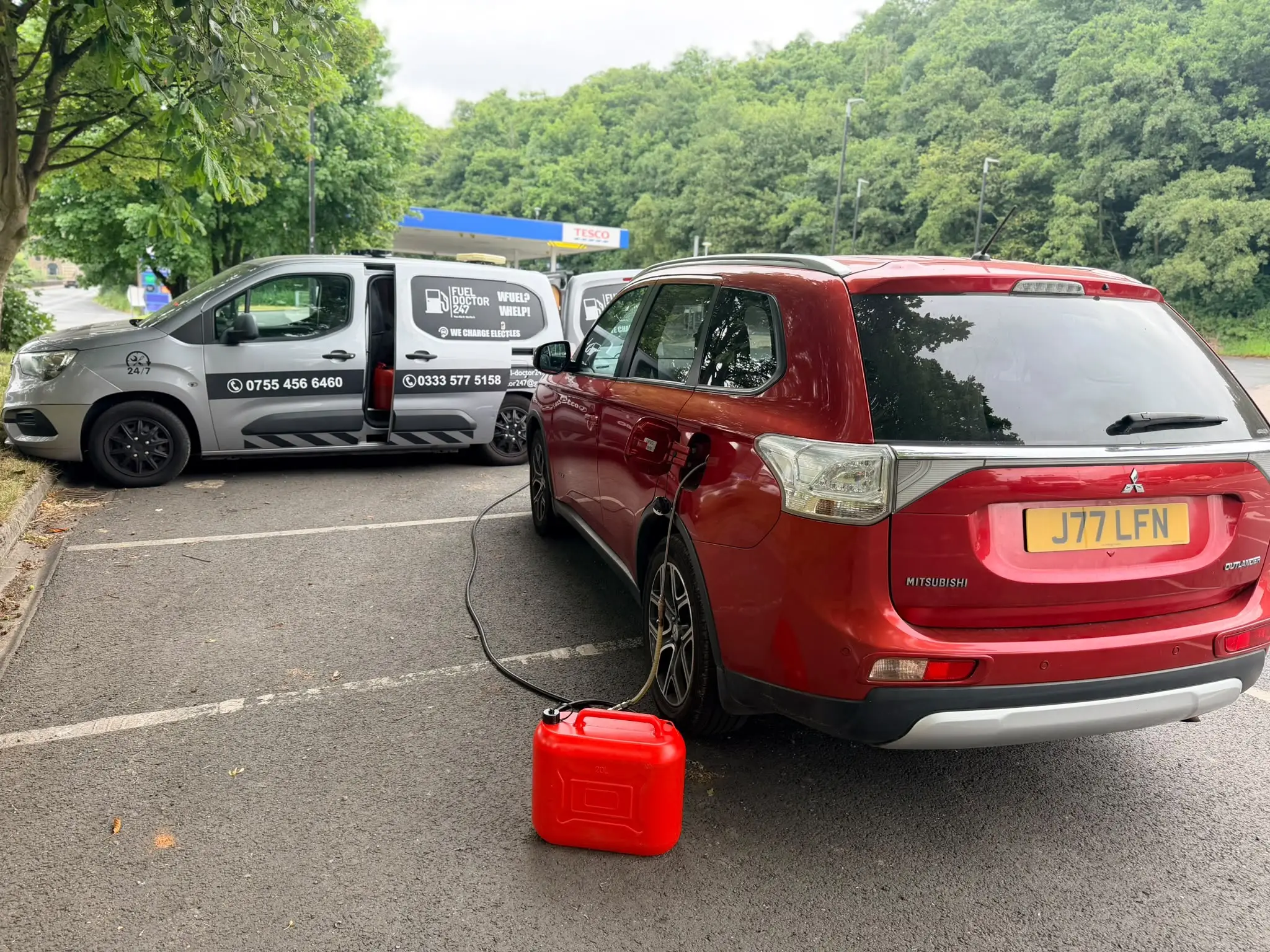 Drain Doctor Manchester service van assisting a stranded vehicle at the roadside