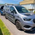 Fuel Doctor 247 mobile callout van connected to a blue car at a Merseyside holiday park