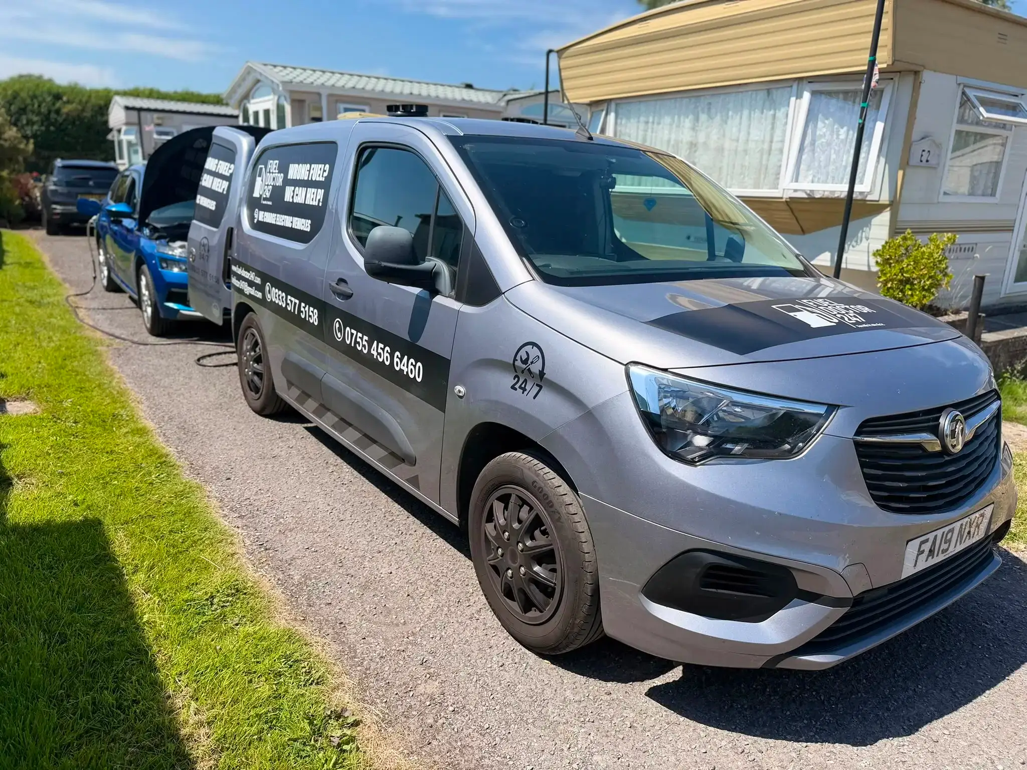 Fuel Doctor 247 mobile callout van connected to a blue car at a Merseyside holiday park