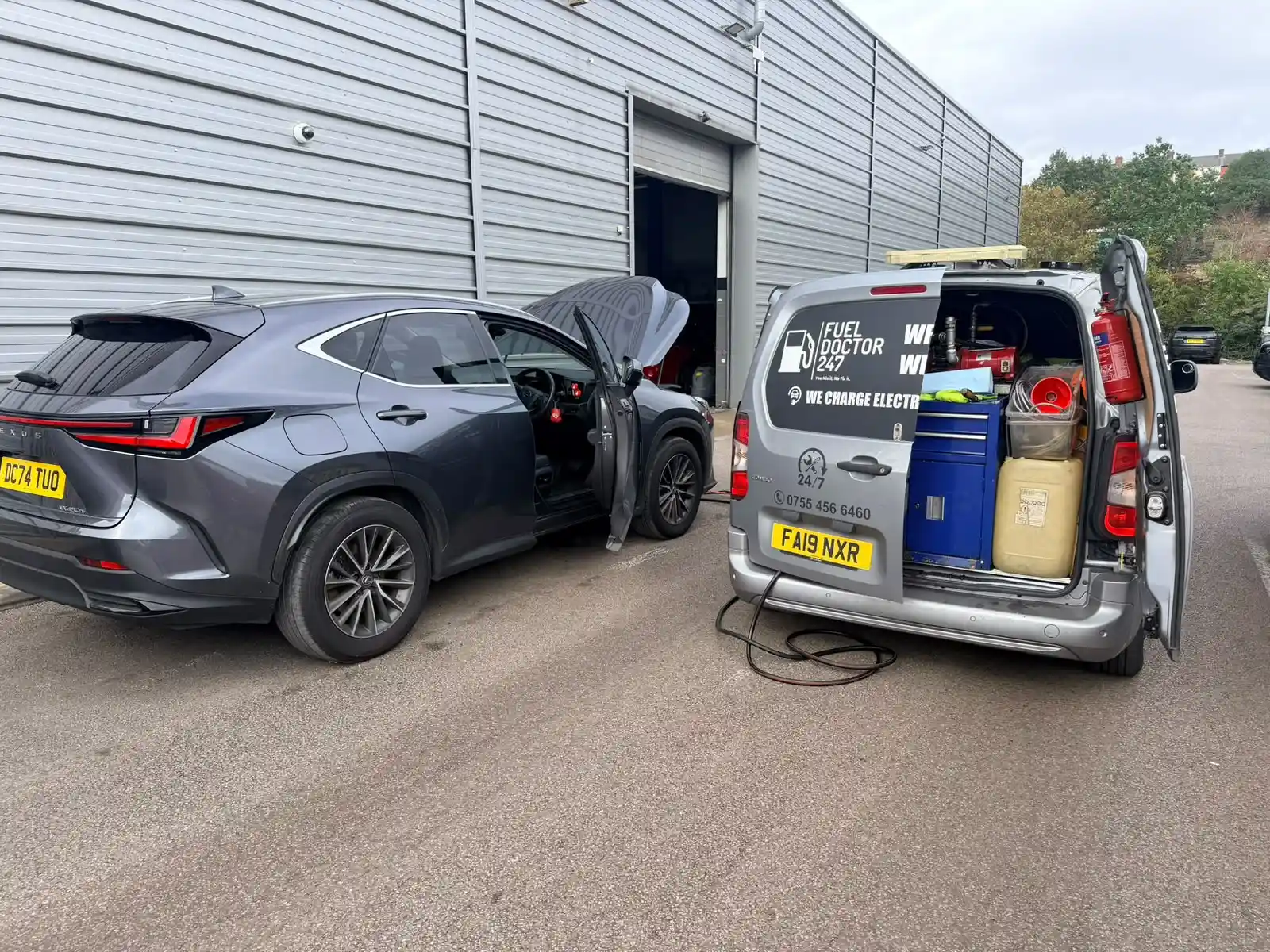 Small amount of petrol in a diesel car being drained by a UK fuel recovery technician.